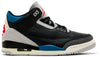 Air Jordan 3 Retro OG 'Rare Air' 2025 black leather sneaker with grey suede overlays, blue and red accents, and Nike Air heel branding.

