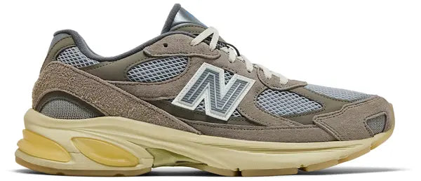 New Balance 2010 'Grey Day 2025' sneaker in grey suede and mesh with molded 'N' logo and cream ABZORB midsole.