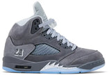 Air Jordan 5 Retro Wolf Grey 2026 sneaker in layered grey nubuck with white stitching and netting.