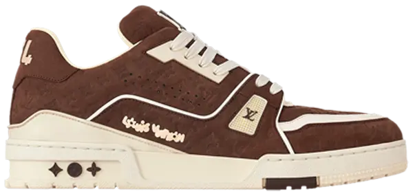 Tyler, the Creator x Louis Vuitton Trainer 'Mocha' in brown nubuck with white piping, embossed monogram, and cream rubber sole.
