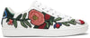 Gucci Wmns Ace 'Floral' sneaker in white leather with floral embroidery and snakeskin heel detai