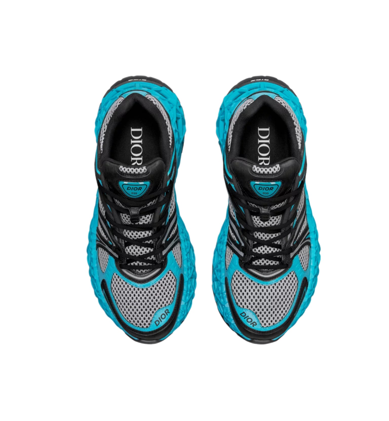 Pair of blue and gray sneakers with Dior branding on a light gray background