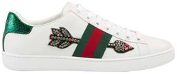 Gucci Wmns Ace Embroidered 'Arrow' in white leather with beaded arrow detail, Web stripe, and red and green metallic snakeskin heel tabs.