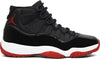Air Jordan 11 Retro 'Bred' 2019 with black mesh upper, high-cut patent leather, white midsole, and Varsity Red translucent outsole.