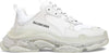 Side view of the Balenciaga Wmns Triple S showcasing the clear layered sole and distressed design.