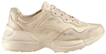 Gucci Wmns Rhyton 'Distressed Ivory' sneaker in aged cream leather with chunky sole and vintage finish.

