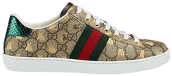 Gucci Wmns Ace GG Supreme 'Bees' sneaker in beige and ebony canvas with gold bee embroidery and green-red Web stripe.

