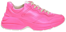 Gucci Wmns Rhyton 'Fluorescent Pink' sneaker in vibrant pink leather with chunky tonal sole.

