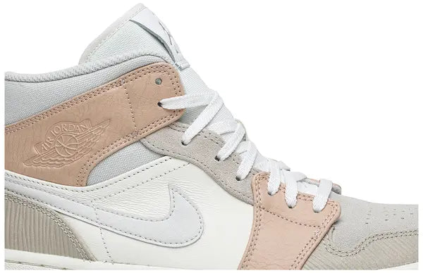 Air Jordan 1 Mid 'Milan' sneaker featuring beige suede and leather upper with MLN hangtag and Air cushioning.