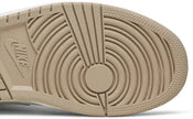 Air Jordan 1 Mid 'Milan' sneaker featuring beige suede and leather upper with MLN hangtag and Air cushioning.