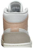 Air Jordan 1 Mid 'Milan' sneaker featuring beige suede and leather upper with MLN hangtag and Air cushioning.