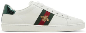 Gucci Wmns Ace Embroidered 'Bee' sneaker in white leather with green-red Web stripe and gold bee embroidery.