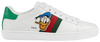 Disney x Gucci Wmns Ace sneaker in white leather with embroidered Donald Duck patch and green-red Gucci Web detailing.

