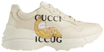 Bananya x Gucci Wmns Rhyton 'Ivory' sneaker showcasing Bananya anime character on soft ivory leather upper with chunky sole.

