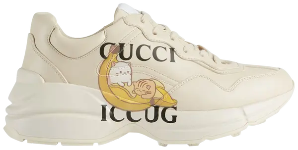 Bananya x Gucci Wmns Rhyton 'Ivory' sneaker showcasing Bananya anime character on soft ivory leather upper with chunky sole.

