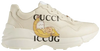 Bananya x Gucci Wmns Rhyton 'Ivory' sneaker showcasing Bananya anime character on soft ivory leather upper with chunky sole.

