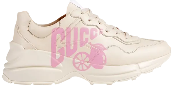Gucci Wmns Rhyton 'Lemon Gucci' sneaker in cream leather with Lemon Gucci graphic on side.

