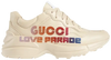 Gucci Wmns Rhyton 'Love Parade' sneaker in beige leather with chunky sole and vintage-inspired design.

