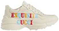 Gucci Wmns Rhyton 'Exquisite Gucci - Ivory' sneaker with bold text graphic on ivory leather and oversized sole.

