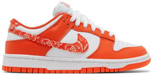 Nike Dunk Low Women’s 'Orange Paisley' sneaker with white leather upper, orange overlays, and paisley print Swoosh.