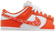 Nike Dunk Low Women’s 'Orange Paisley' sneaker with white leather upper, orange overlays, and paisley print Swoosh.