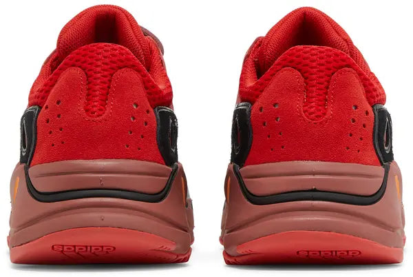 Yeezy Boost 700 ‘Hi-Res Red’ sneaker with red mesh and suede upper, maroon Boost midsole, and multicolor accents.