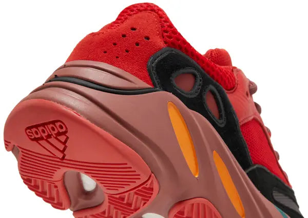 Yeezy Boost 700 ‘Hi-Res Red’ sneaker with red mesh and suede upper, maroon Boost midsole, and multicolor accents.