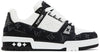 Louis Vuitton Trainer 'Denim Noir' 2022 sneaker with white leather upper, black denim panels, and tonal monogram details.

