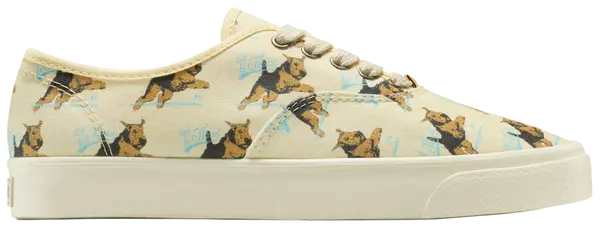 Golf Le Fleur x Converse Naut-1 'Darryl' sneaker in cream canvas with pastel yellow and bright gold accents, showcasing Le Fleur and Darryl all-over print.

