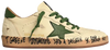 Golden Goose Ball Star white leather sneaker with rich green accents and distressed finish.
