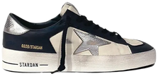 Golden Goose Stardan in optic white leather with navy star and silver heel tab, distressed finish.
