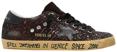 Golden Goose Superstar brown glitter sneaker with 'Still Dreaming in Venice' text and distressed sole.