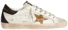 Golden Goose women's Superstar sneaker with gold star, black heel tab, and distressed white leather upper.