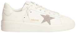 Golden Goose Swarovski Purestar women’s white leather low-top sneaker with silver Swarovski crystal star and distressed rubber sole.


