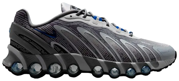 Better Gift Shop x Nike Air Max DN8 'Revenge' 2025 sneaker with grey mesh upper, reflective overlays, blue mini-Swoosh, and exposed Air tube cushioning.

