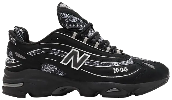 atmos x New Balance 1000 'Bāṅdhnū' sneaker with black and white paisley print, nubuck overlays, and ABZORB midsole cushioning.


