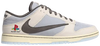 Travis Scott x Playstation x Dunk Low in cream with PlayStation logo, katakana text, and translucent outsole.