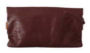 Elegant Brown Leather Clutch with Silver Detailing.